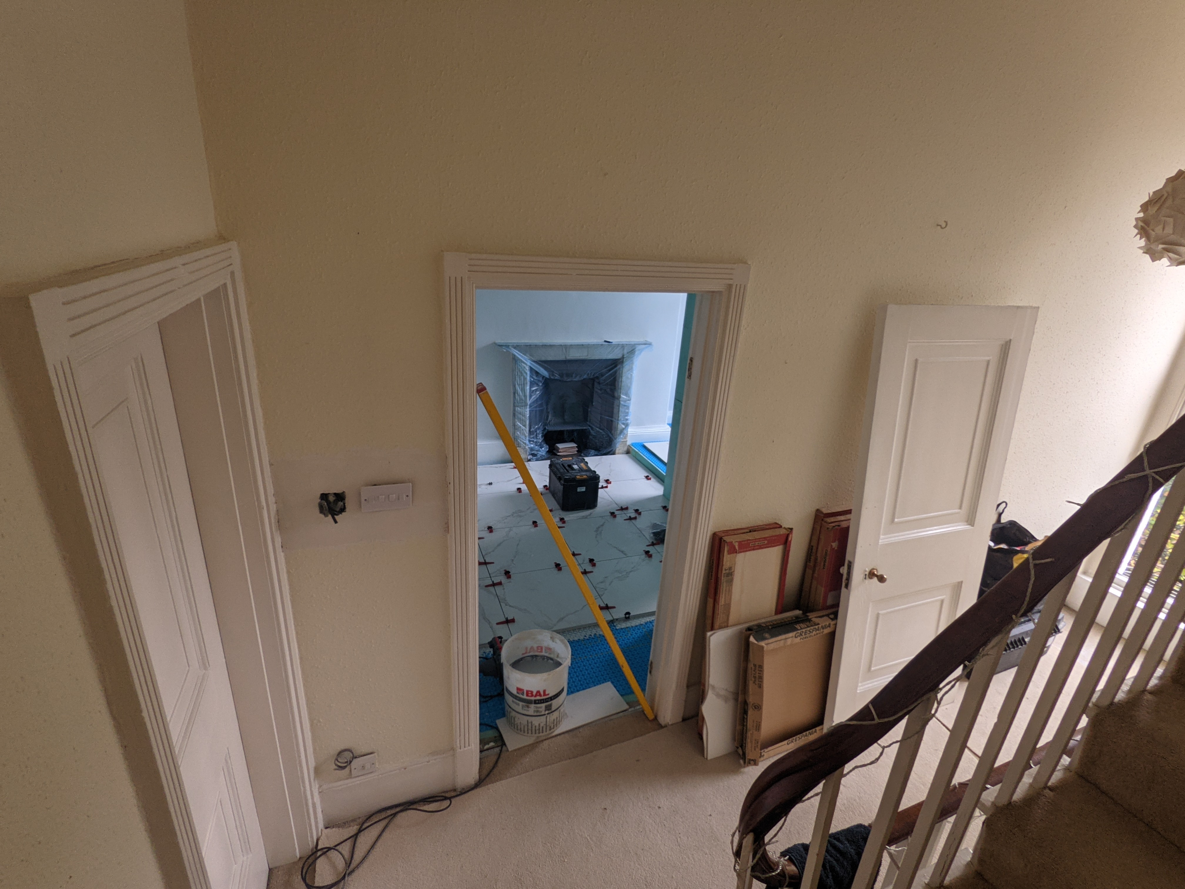 Top tip!  Remember to remove any inward opening doors before you increase the height of the floor in a room!